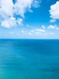Scenic view of blue sea against sky