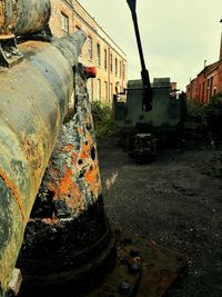 Abandoned train on railroad track against sky