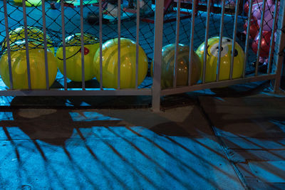 Close-up of yellow shadow on tiled floor