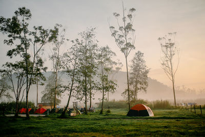 Tent on field against sky