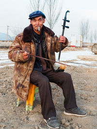 Low angle view of man standing on field