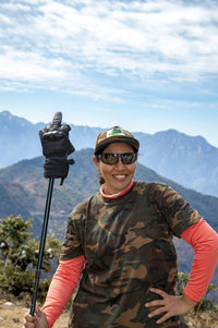 Beautiful female traveler at kartik swami trek in uttarakhand