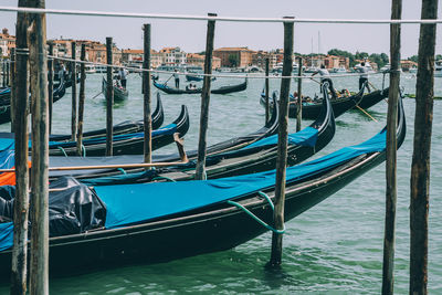 Boats moored in canal