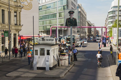 People walking on street in city