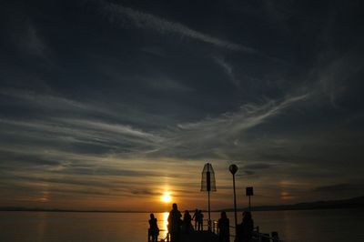 Scenic view of sea against sky at sunset