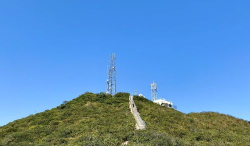 Low angle view of tower against clear blue sky