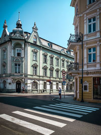 View of city street against building