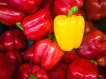 Full frame shot of red bell peppers in market