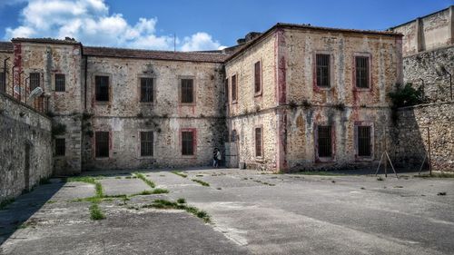 Old ruin building in city