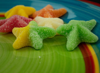 Close-up of sweet food in star shape over plate