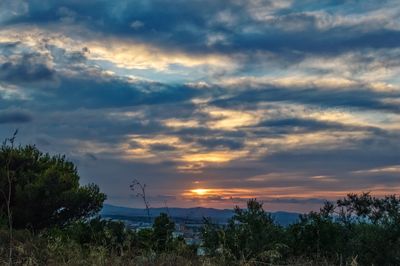 Scenic view of dramatic sky during sunset