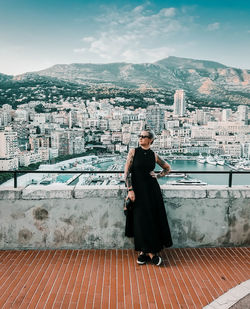 Lady in front of skyline of monaco 