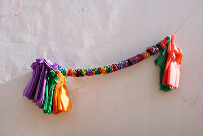 Clothes drying against wall