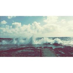 View of sea against cloudy sky