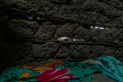 Low angle view of multi colored rocks on bed