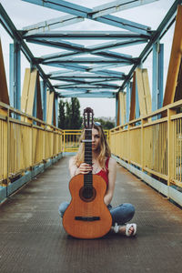 Young woman playing guitar