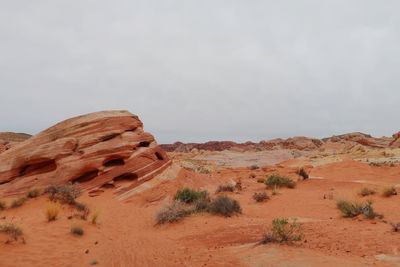 Rock formations in desert against sky