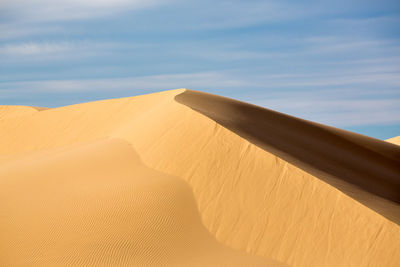 Scenic view of desert against sky