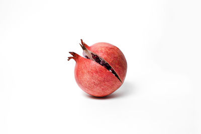 Close-up of apple against white background