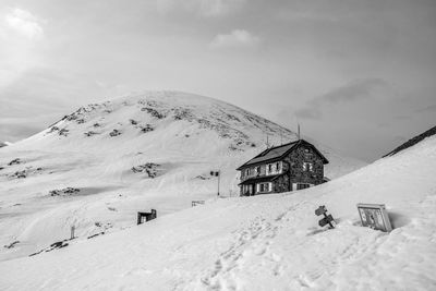 Scenic view of snow covered mountain against sky