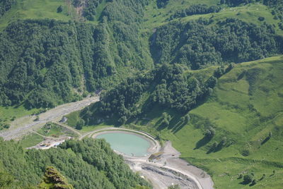 High angle view of road amidst trees