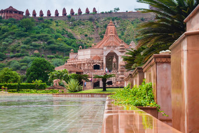 Artistic red stone jain temple at morning from unique angle