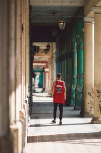 Full length portrait of man standing in building