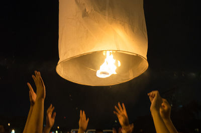 Close-up loy krathong lantern being released in chiang mai, thailand