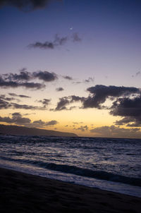 Scenic view of sea against dramatic sky