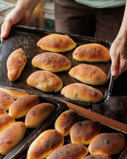 Midsection of man preparing food