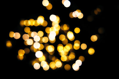 Defocused image of illuminated lights at night