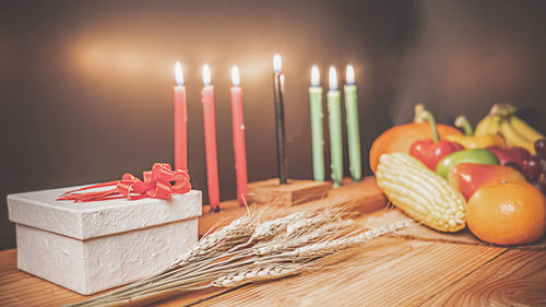 Close-up of candles on table