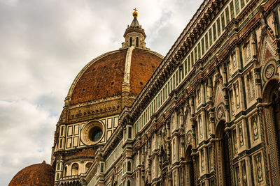 Low angle view of duomo santa maria del fiore against sky in city