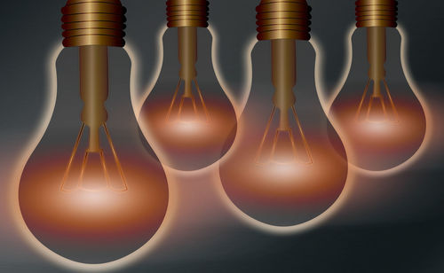 Close-up of illuminated light bulb