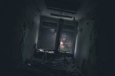 Stars seen through window in abandoned room