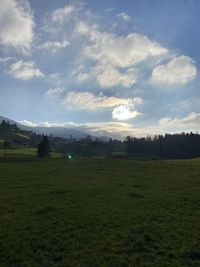 Scenic view of field against sky