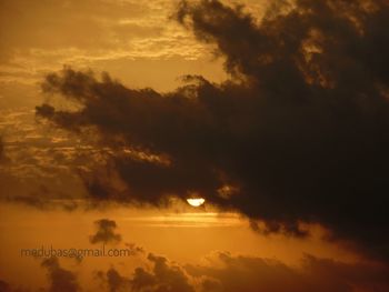 Low angle view of dramatic sky during sunset