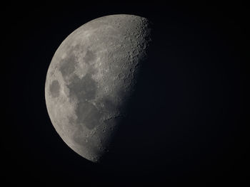 Low angle view of moon against sky at night