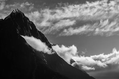 Low angle view of mountain range against sky