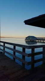 Pier on sea against sky