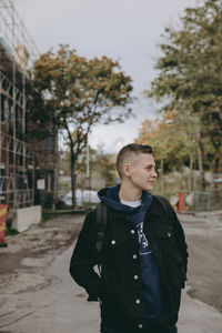 Young man looking at camera