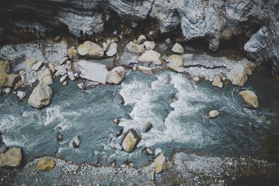 Reflection of rocks in water