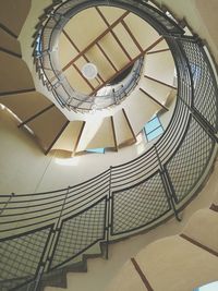 Low angle view of spiral staircase in building