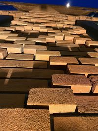 Stack of empty seats in row