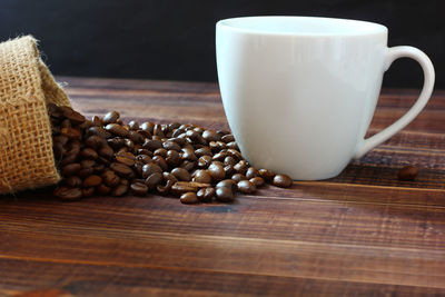 Close-up of coffee cup on table