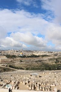 Aerial view of town against sky