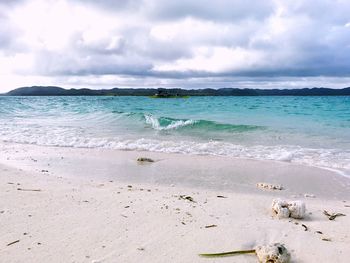 Scenic view of beach against sky