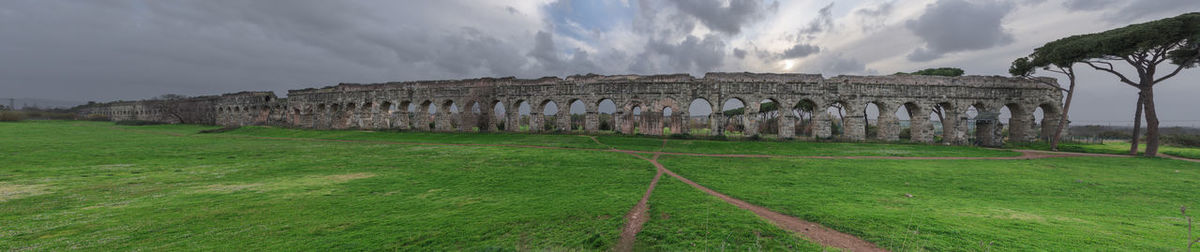 View of old ruin building against cloudy sky