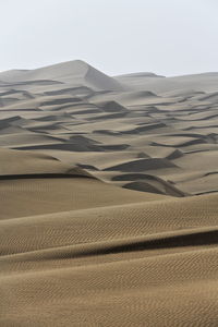 Scenic view of desert against clear sky