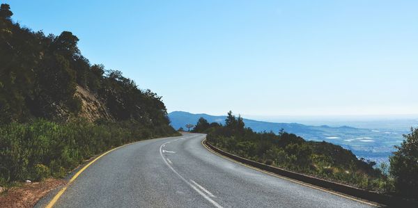 View of winding empty road